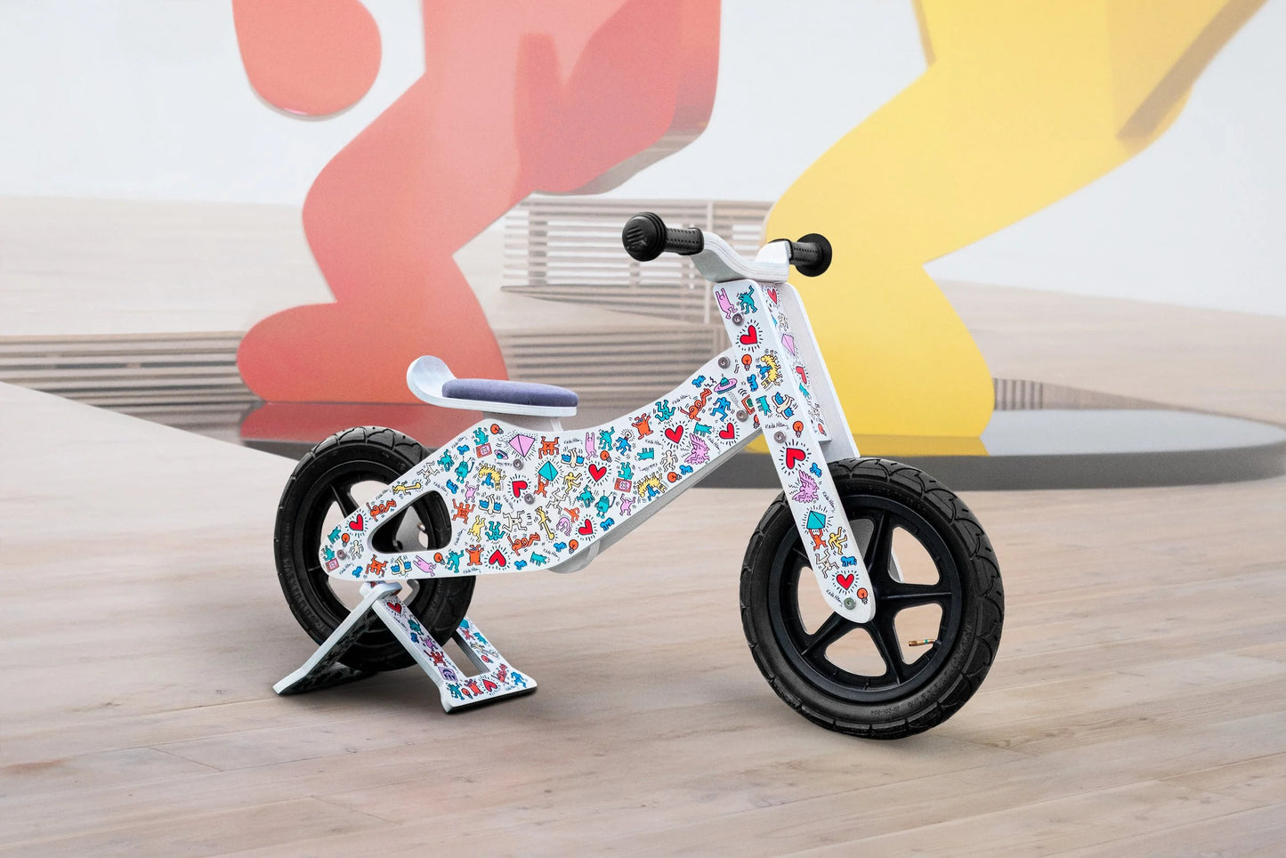 Keith Haring x Affinity balance bike with matching stand