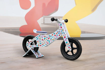 Keith Haring x Affinity balance bike with matching stand