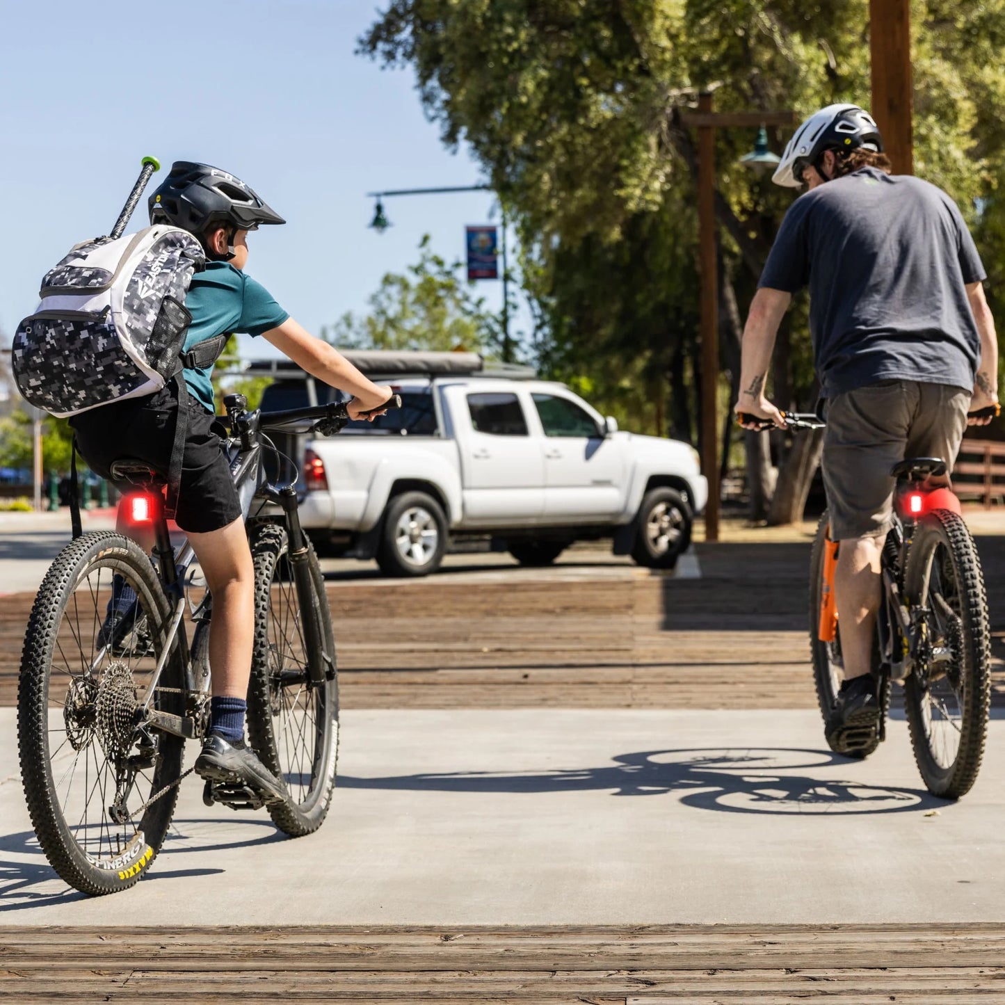NiteRider VMAX+ 180 wearable bike safety light clip. mounted on seat post visible in daylight