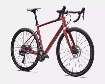 Specialized Diverge E5 gravel bike in Spice color front 3/4 view with carbon fork, Shimano drivetrain and disc brakes

